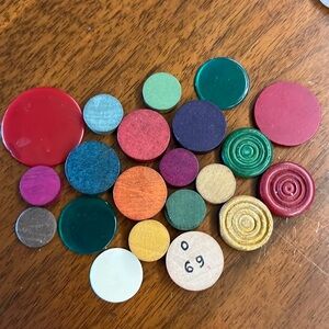 Assorted vintage game markers.